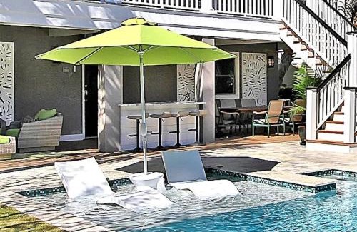 Isle of Palms Casa | Backyard Oasis- Steps 2 Beach, Private Pool & Bar, Sleeps 16, 7 Bedrooms 5 and a half bathrooms "The Lucky Penny"