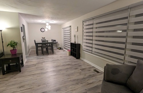 Kitchener Casa | Backyard Oasis with Pool, Hot tub & Fire table. 4 bedrooms, gym, & a yoga area!