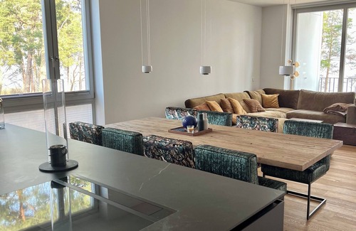 Bad Saarow Apartamento | Bad Seerose, cozy vacation apartment with lake view, roof terrace, pool and sauna