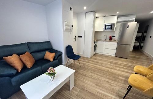 Andujar Apartamento | BAJO A habitación con literas Apartamentos JUAN ROBLEDO Centro Ciudad