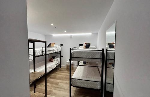 Andujar Apartamento | BAJO A habitación con literas Apartamentos JUAN ROBLEDO Centro Ciudad