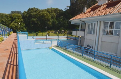 Isla Apartamento | Bajo en la playa con piscina - La Arena 4203