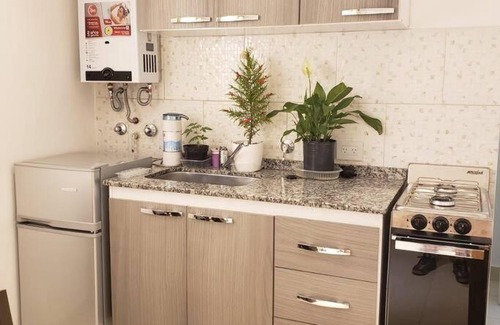 Villa Carlos Paz Apartamento | Balcones del Cerro Mono ambiente céntrico 2p - camas simples