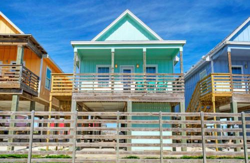 Flour Bluff Casa | Balcony w Bay View Shared Pool Boat Dock Fat Flounder by AvantStay