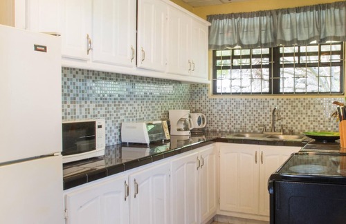 Welches Apartamento | BK Villas-Barbados tres grandes habitaciones cerca del mar