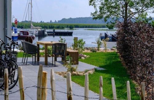 Altwarp Casa | Barrierefreies Ferienhaus in Altwarp mit Sauna, Kamin und Wasserblick