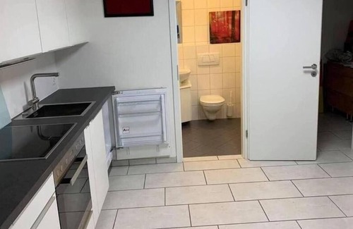 Muttenz Apartamento | Basel - 5 mins away - Modern Basement Studio with Kitchen 35m2 in Muttenz