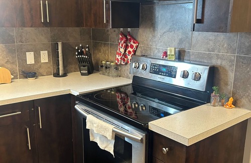 Airdrie Casa | Basement suite with full kitchen