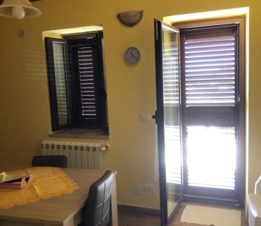 Basico Casa | Basicò un balcone sul mare-Casa I CARRUGGI- Case vacanza Sicilia&Toscana-