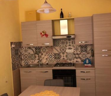 Basico Casa | Basicò un balcone sul mare-Casa I CARRUGGI- Case vacanza Sicilia&Toscana-