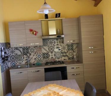 Basico Casa | Basicò un balcone sul mare-Casa I CARRUGGI- Case vacanza Sicilia&Toscana-