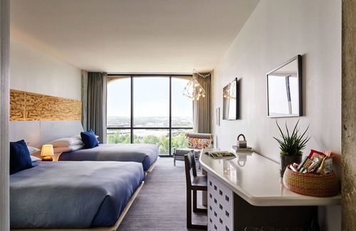 Congress Avenue Historic District Hotel | Bask in Modern Style Comfort! Downtown Views, Pet-friendly Property w/ Pool