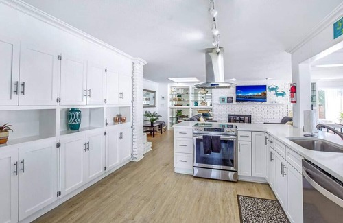 Woodlawn Casa | Frente al hogar en la bahía! Duerme 20! PISCINA CLIMATIZADA PRIVADA / TINA CALIENTE / BARCO 4 ALQUILER