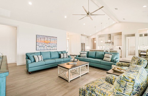 Rockport Casa | Bayfront water-view home with outdoor pool, lovely patio, hammock, fishing dock