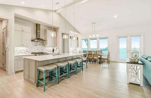 Rockport Casa | Bayfront water-view home with outdoor pool, lovely patio, hammock, fishing dock