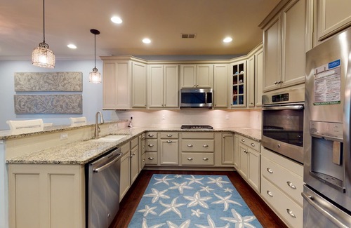 Bayside Casa | Bayside Resort townhouse w/ free WiFi, pool, golf on-site, and fireplace
