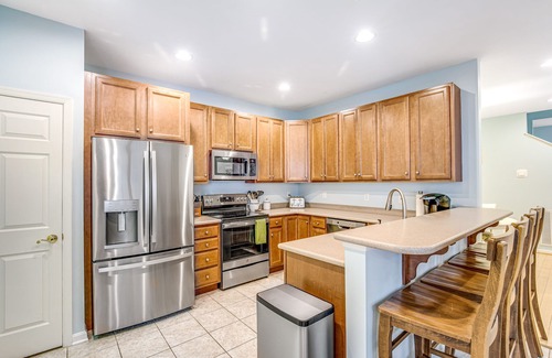 Sun Ridge Casa | Bayside Resort townhouse with golf on-site, pool access, fireplace, & central AC