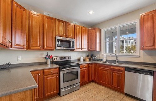 Sun Ridge Casa | Bayside Resort townhome with WiFi, balconies, fireplace, onsite pools, & hot tub