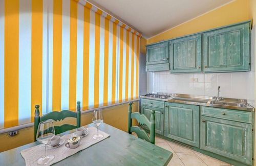 Sos Alinos Apartamento | Apartamento frente a la playa en Orosei