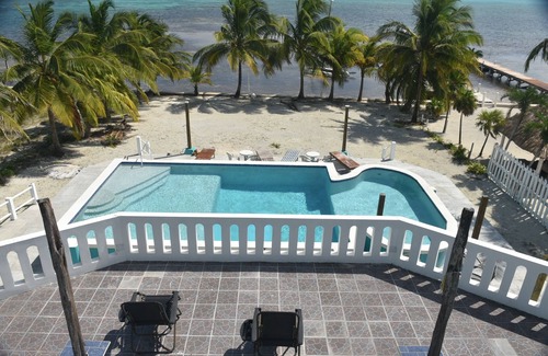 Boca Ciega Villa | Beach front in welcoming San Pedro w/ AC, pool, fitness room, WiFi, kitchenette