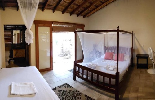 Las Penitas Casa | Habitacion de hotel frente a la playa con desayuno