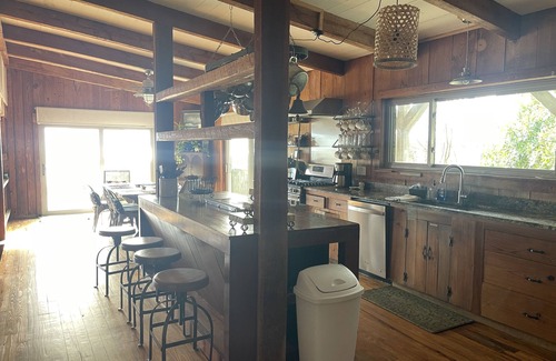 Alligator Point Casa | BEACH FRONT to BAY with boatdock, swimming pool, pickleball courts and kayaks.