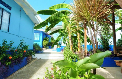 Buccoo Apartamento | Propiedad frente a la playa, Bucco Bay, aire acondicionado + WIFI, 'habitación triple' MGH