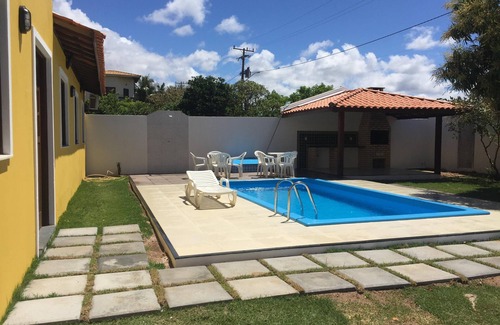 Barra do Jacuipe Casa | Casa de playa en el condominio Aldeas do Jacuipe con vistas al mar y c piscina
