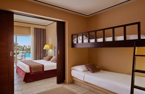 Sharm El Sheikh Hotel | Beach Retreat: 2 Rooms, 12 Pools, Waterslides, Spa, Kids’ Club, Games & Dining