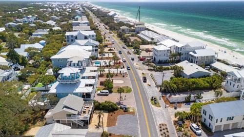 Seacrest Casa | Beach Retreat w Sundeck Golf Cart Bikes Bungalow House by AvantStay