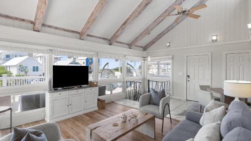 Seacrest Casa | Beach Retreat w Sundeck Golf Cart Bikes Bungalow House by AvantStay