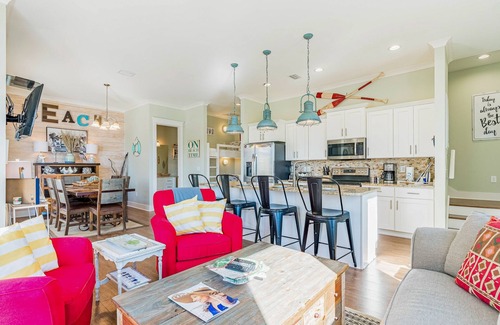Gulf Shores Cabaña | Beach-view cottage near beach with pool, wrap-around balcony, boat dock, W/D, AC