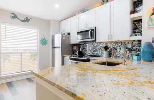 Corpus Christi Condominio | Beachclub Summary: Go
