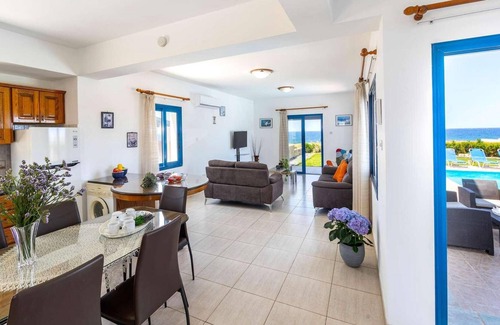Pomos Villa | Beachfront 3 bed villa with sea views.