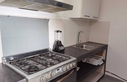 Puerto Juarez Apartamento | Beachfront apartment Cancun next to isla mujeres C-601