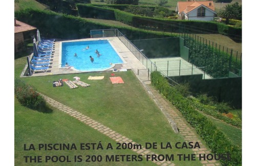 Mogro Apartamento | Apartamento frente a la playa con piscina a 200m y pista de padel