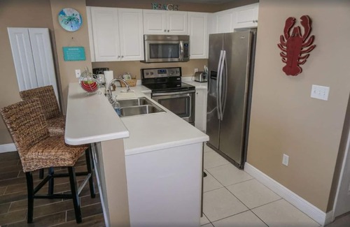 Miramar Beach Condominio | FRENTE AL MAR !! Sillas de playa GRATIS !! NUEVO colchón Pillowtop !! ¡NUEVA lavadora y secadora!