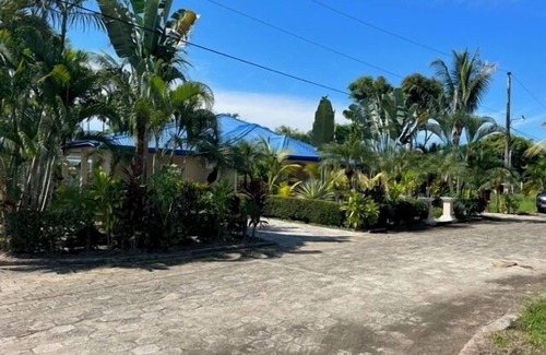 Tela Casa | Beachfront getaway,5 minutes from shore! Featuring a pool & recreational spaces.