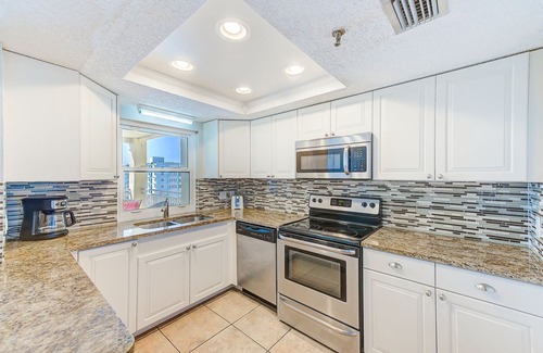 North Redington Beach Condominio | Unidad 601: Mejor precio para una unidad de piso superior de tres habitaciones.