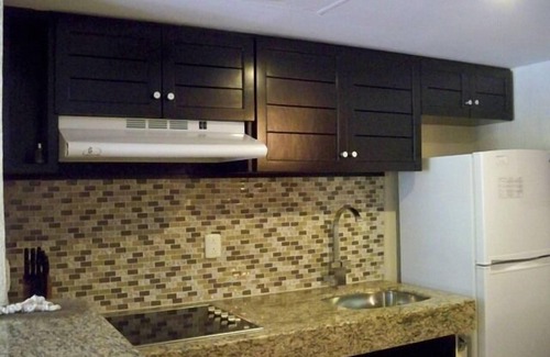 Puerto Aventuras Condominio | Ubicación frente al mar con 2 piscinas; Terraza Privada