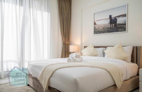 Al Hamra Village Apartamento | Beachfront Luxury 1BR Sea View