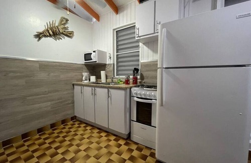 El Combate Cabina | Beachfront Rustic Cabin by Sunset Village - Orange
