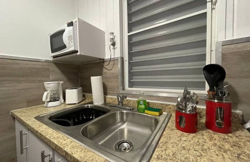 El Combate Cabina | Beachfront Rustic Cabin by Sunset Village - Orange