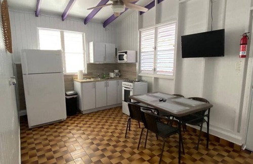 El Combate Cabina | Beachfront Rustic Cabin by Sunset Village - Purple