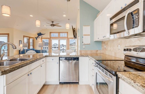 Buck Island Casa | Beachin Fun (North Unit) | 1665 ft to the beach | Hot Tub, Dog Friendly, and Community Pool