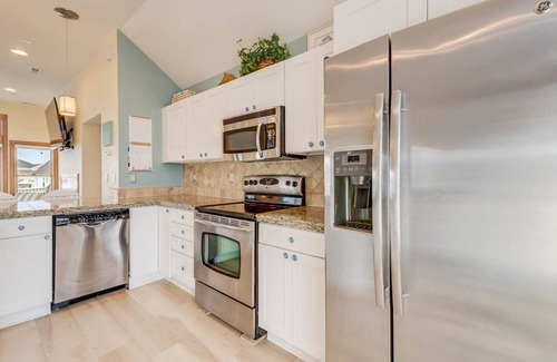 Buck Island Casa | Beachin Fun (North Unit) | 1665 ft to the beach | Hot Tub, Dog Friendly, and Community Pool