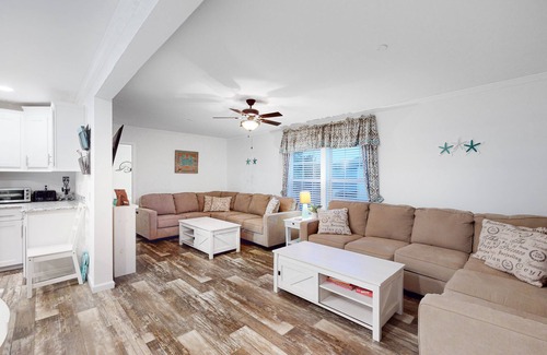 Montego Bay Casa | Beachy bayside home in quiet neighborhood with patio, central AC, pool, & tennis