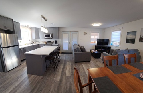 Grand-Digue Casa | Beausoleil Saltwater Sunsets RnR on Acadian Coast with WiFi, Hot Tub, Air Hockey