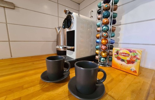 Stavanger Apartamento | Hermoso apartamento de 2 habitaciones en el centro de la ciudad, con balcón y estacionamiento gratuito.