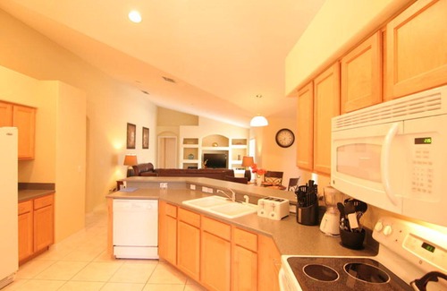 Orange Tree Villa | Luxury 4 Bed / 3 Bath Villa + piscina de gran tamaño con privacidad en Disney Area